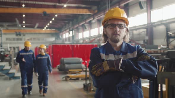 Plant Worker At Workplace Posing For Camera alt