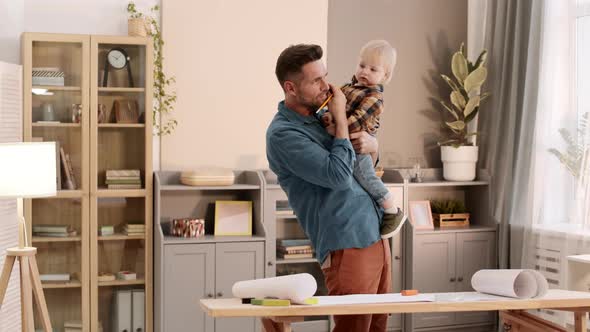 Busy Engineer Working and Babysitting alt