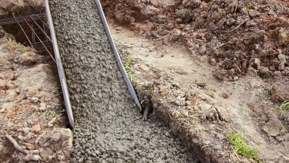 Current Cement Filling the Foundation of a Residential House alt