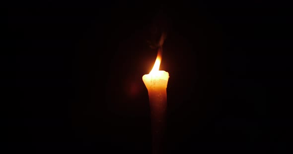Burning Torch On A Black Background