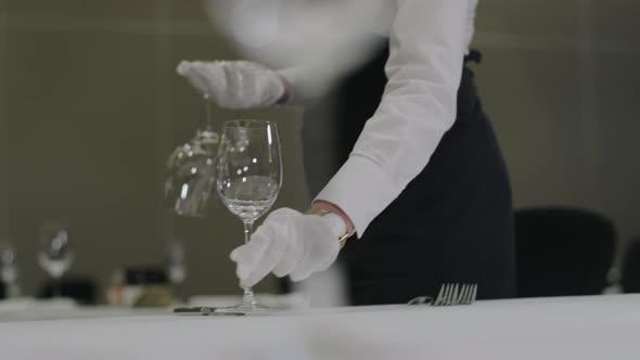 A Waiter Sets the Table