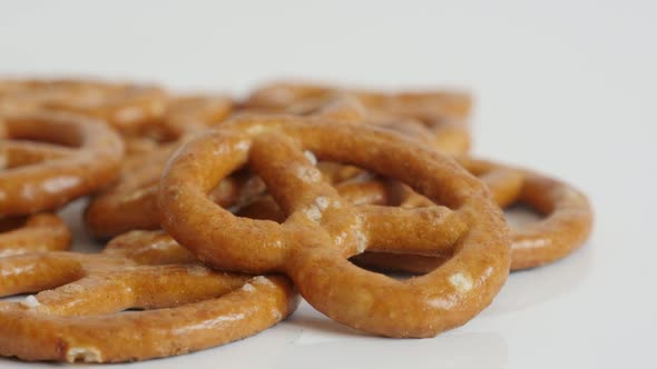 Pretzel popular snack close-up 4K 2160p 30fps UltraHD tilting footage - Baked bread product made fro alt