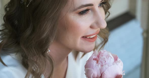 Portrait of Young Woman with Flower Tender and Romantic Model Holds Peony