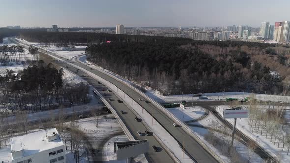 Aerial view of Transport interchange with car traffic in winter city 02 alt