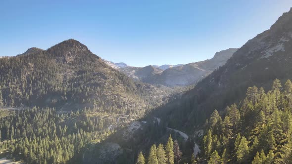 Drone flying in Emerald Bay flying towards Eagle Falls and Desolation wilderness, Tahoe California alt