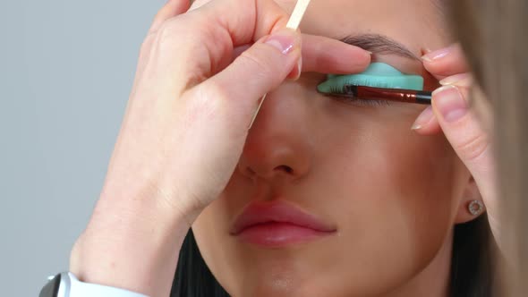 Face of a Young Girl in a Modern Eyelash Lamination Procedure in a Professional Beauty Salon alt