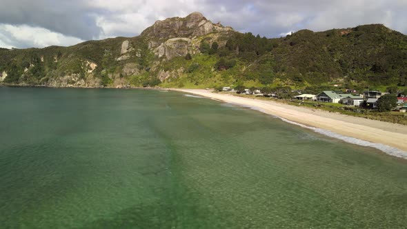 Taupo Bay in New Zealand's North island. Small holiday town with Bach alt