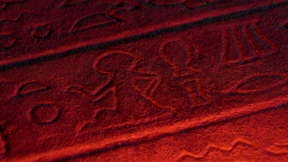 Egyptian Hieroglyph Of Man And Objects In Firelight alt