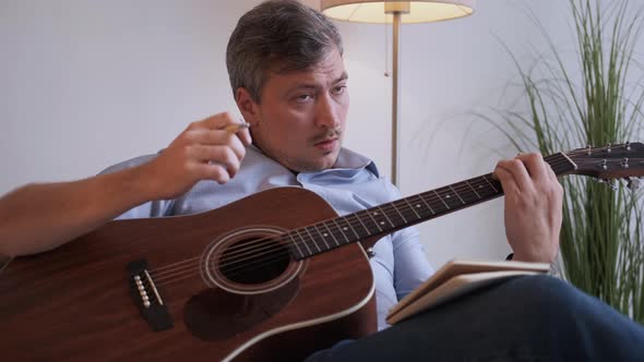 New Melody Inspired Man Composing Music Casual alt