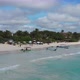 Aerial View of a Group of Fisher Boats Moored on a Tropical Beach in Tulum, Mexico - VideoHive Item for Sale