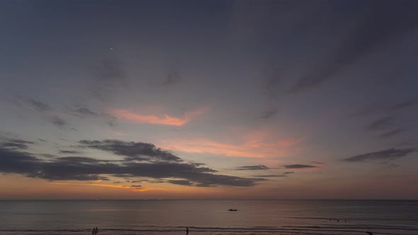 Time Lapse Stunning Red Sky In Twilight Above The Ocean. alt