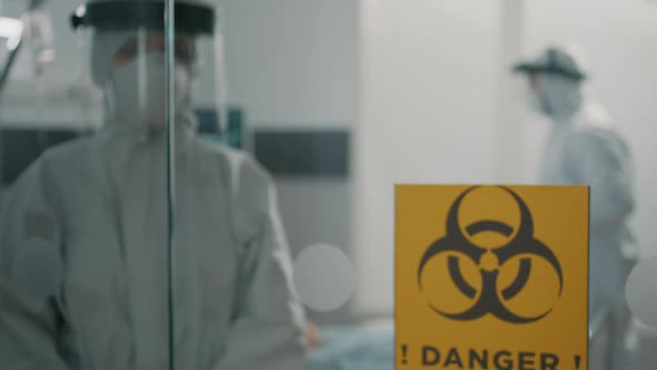 Portrait of Medic Wearing Hazmat Suit in Lockdown Zone alt