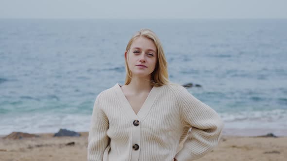 Portrait of Stylish Blonde Woman On Beach