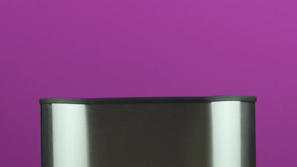 Preparation of Breakfast Toast of Grain Bread Roasted in a Toaster Shot on a Colored Background alt