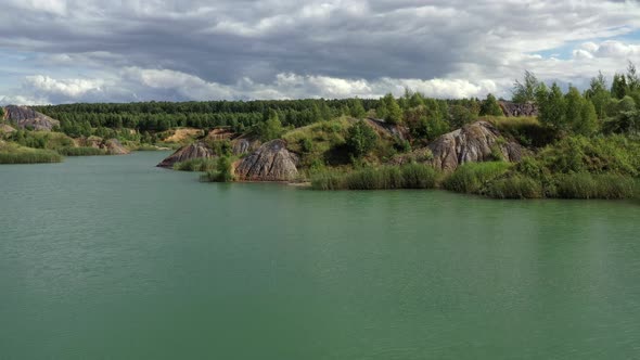 Flying above the lake in the abandoned clay quarry