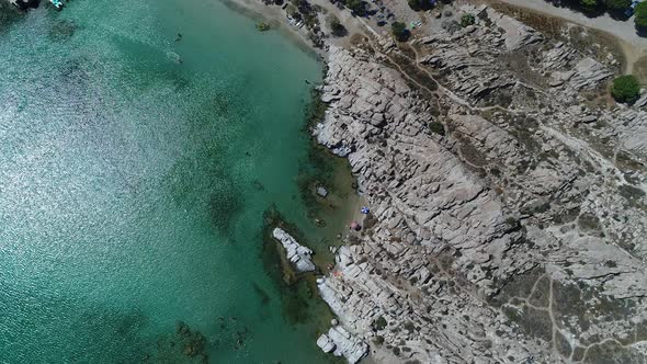 Piperi beach in Naoussa on Paros island in the Cyclades in Greece aerial view alt