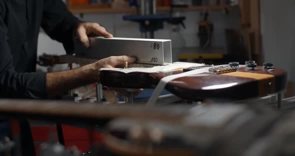 Luthier Sands Guitar Frets at Musical Instruments Repair Shop  60Fps 10 Bit alt