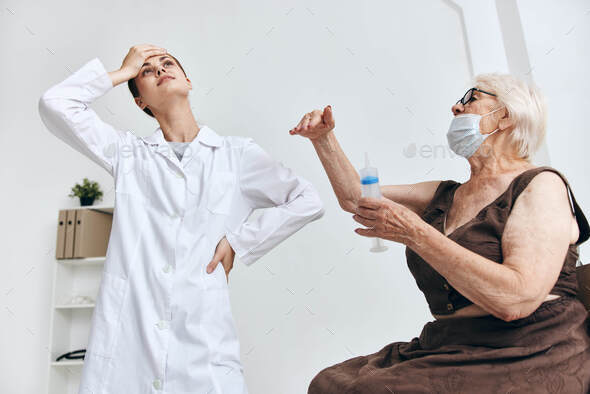 emotional elderly woman syringe injection immunity protection