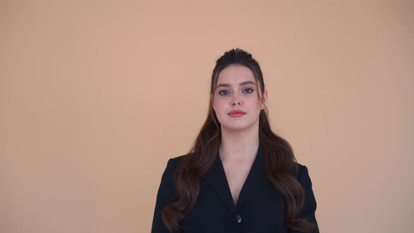 Young Caucasian Business Woman 20 Years Dressed Black Jacket Standing Studio Isolated Beige Color alt