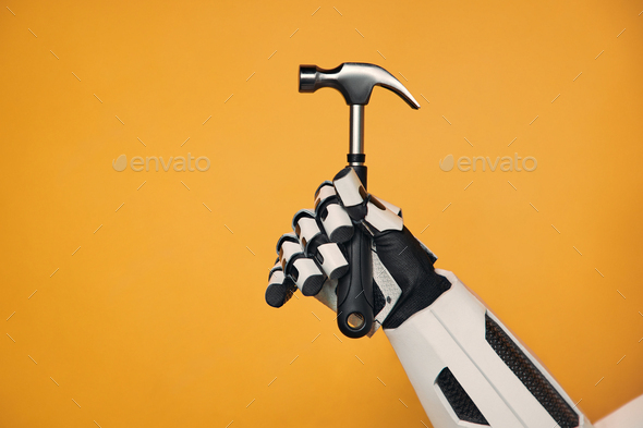 Robot isolated on orange background