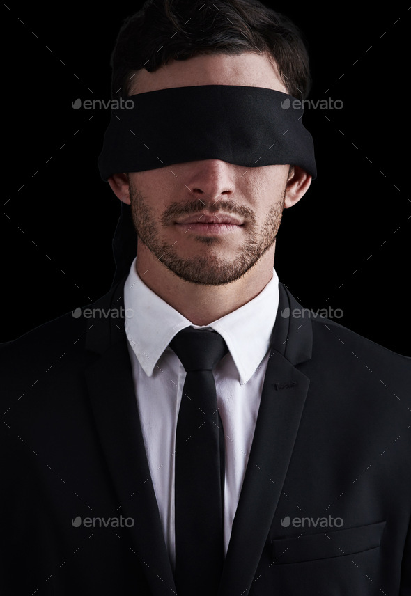 Dark, vision and a business man in a blindfold on a black background for control or censorship. Opp