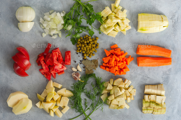 Layout of sliced products top view. Chopped vegetables for the stew.