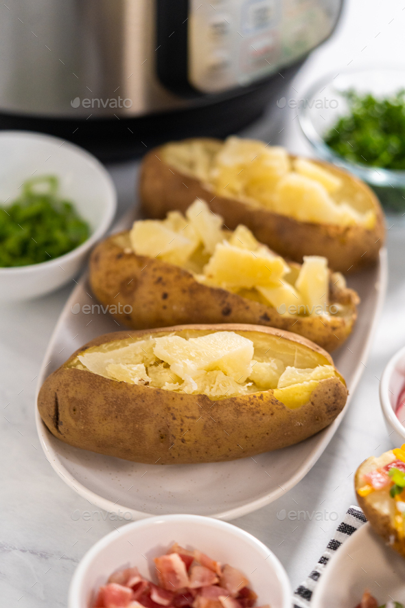 Pressure Cooker Baked Potatoes Stock Photo by arinahabich PhotoDune
