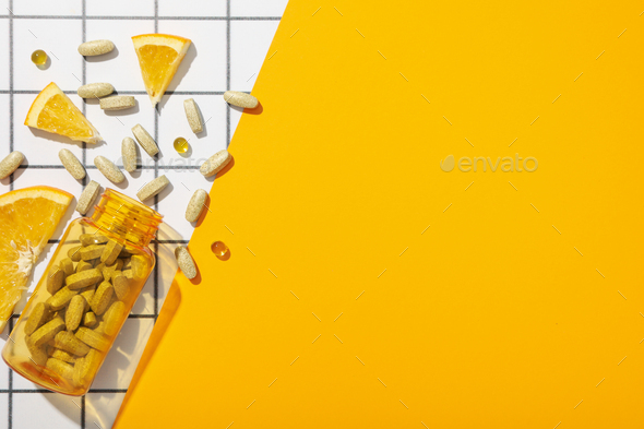 Vitamin C in a bottle in the form of tablets. Stock Photo by AtlasComposer