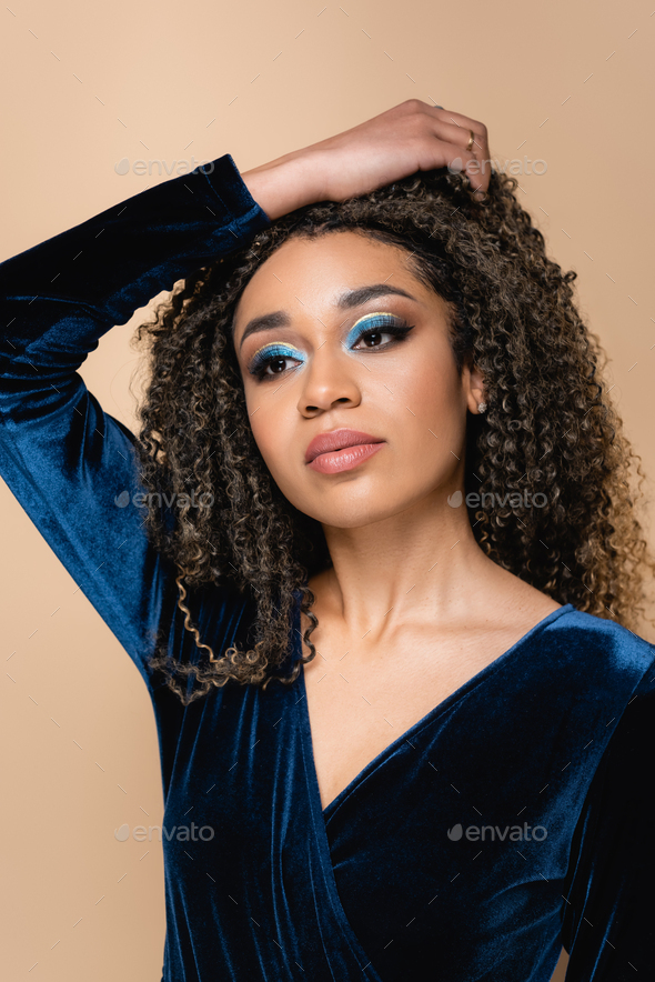 Portrait Of Young Afro Woman With Bright Makeup Stock Photo