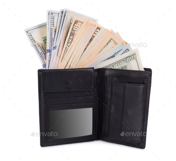 Purse full with dollar bills. Stock Photo by indigolotos PhotoDune