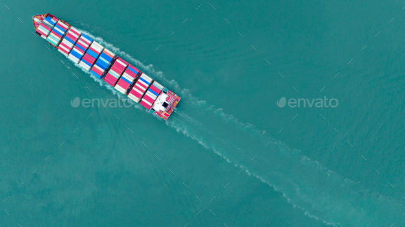 top view cargo ship carrying container and running for export goods from cargo yard port to custom