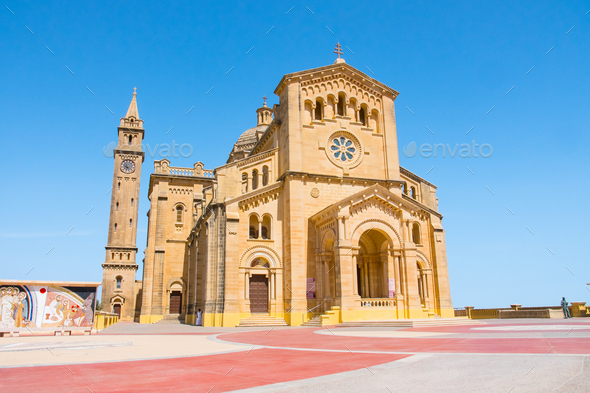 Basilica of the National Shrine of the Blessed Virgin of Ta Pinu in Gozo, Malta under a blue sky - Stock Photo - Images