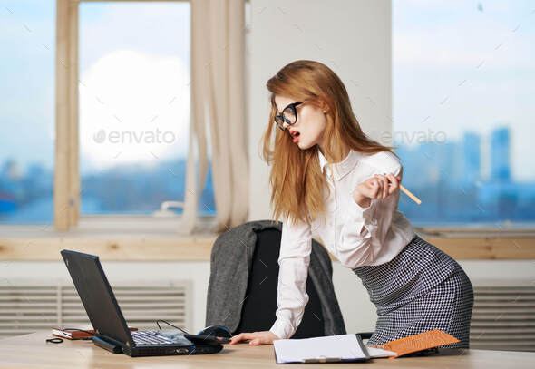 Cute secretary lifestyle attractive work desk in office