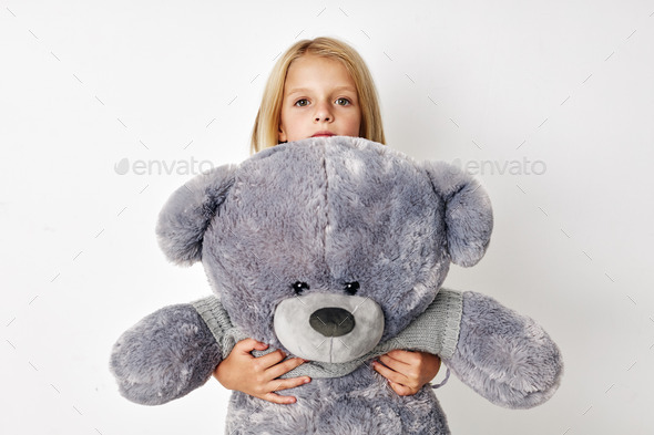 Beautiful Girl With A Teddy Bear Stock Photo