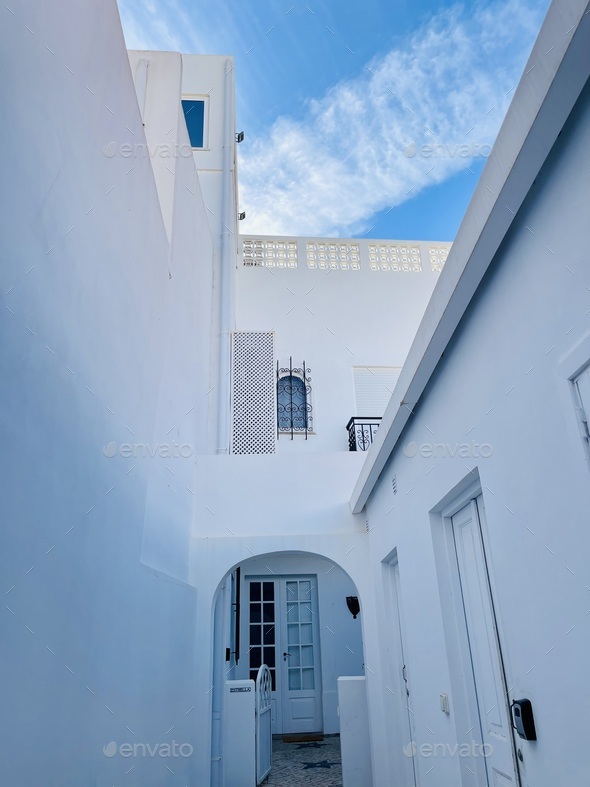 Traditional white architecture and door overlooking the