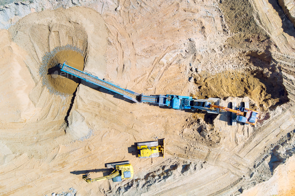 Gravel quarry mining with a cone rock crusher for processing crushed granite