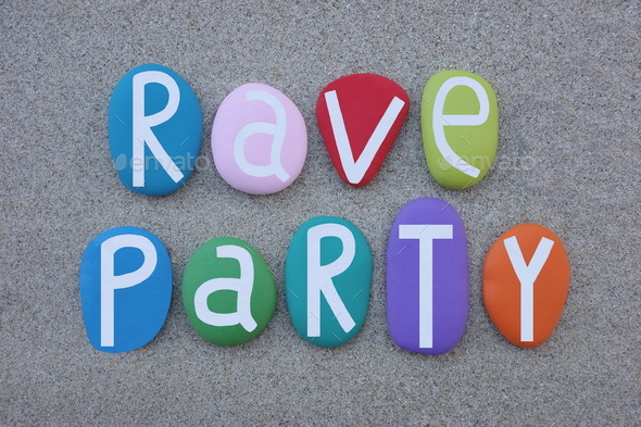 Rave Party text composed with hand painted multi colored stone letters over beach sand