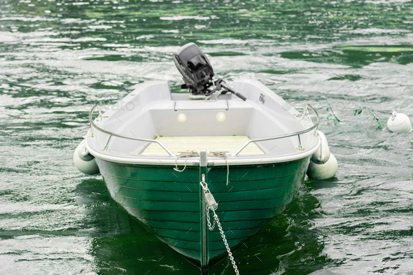 Small fishing boat with fishing net and equipment, motor boat or sail boat  floating Stock Photo by photolime