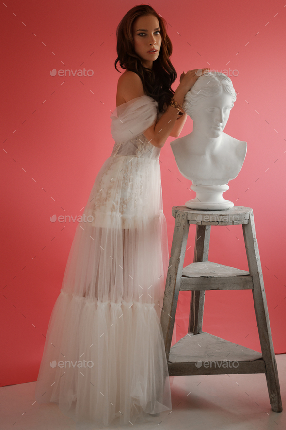 A Girl in a White Wedding Dress Poses, Straightens Her Hair. Stock Footage  - Video of beautiful, space: 250410070
