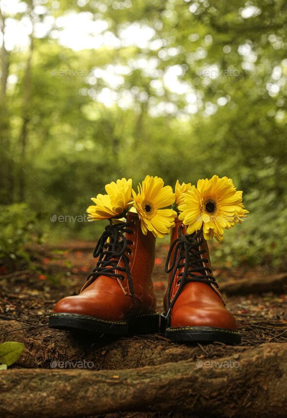 Boots with clearance flowers on them