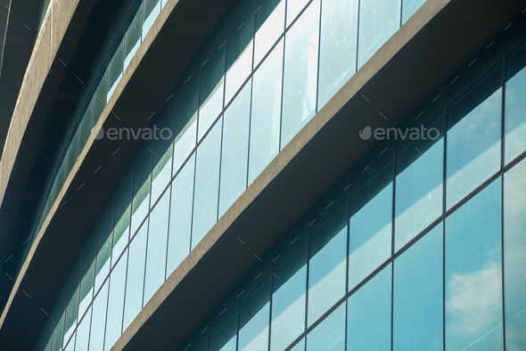 Curtain walling, integrated with solar window films, enhances the energy efficiency of the building