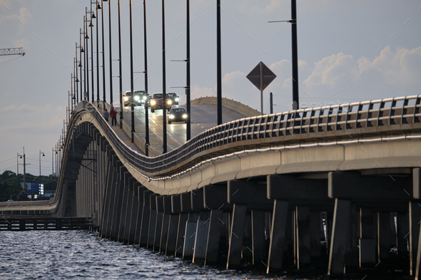 Barron Collier Bridge and Gilchrist Bridge in Florida with moving traffic.
