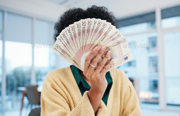 Woman, hand and money fan in financial freedom, investment or savings for profit or growth at offic