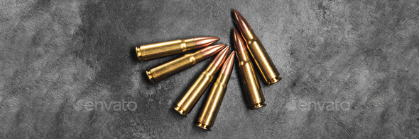 Bullets for Kalashnikov assault rifle banner Stock Photo by Bykfa ...