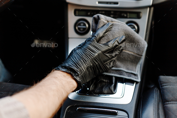 Man S Hand In Black Glove Cleaning Car