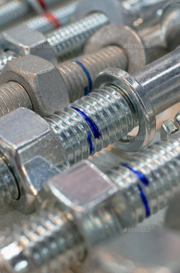 Group of galvanized screwbolts with nuts and washers Stock Photo by