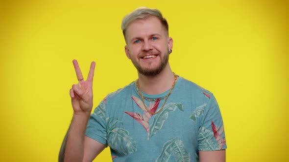 Handsome Stylish Smiling Man Showing Victory Sign Hoping for Success and Win Doing Peace Gesture alt