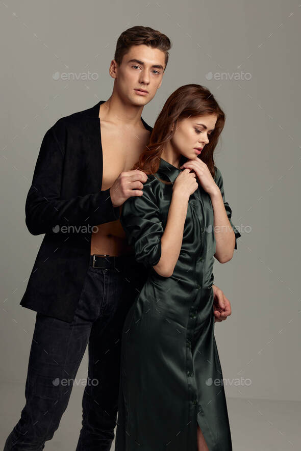 man and woman stand side by side luxury romance moda Studio