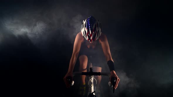 Young Woman Cycling Road Bike Pedaling Bicycle Sport Concept Studio Black alt