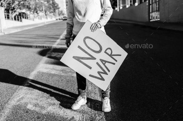 Stop war protest - People on street fighting for peace and human rights - Black and white editing
